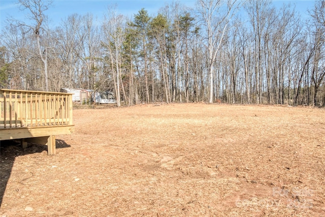 view of yard with a deck