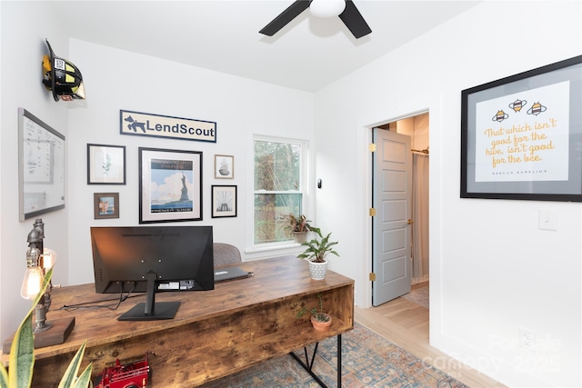 office space with ceiling fan