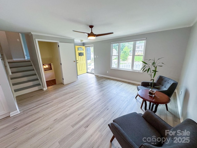7812 Highbanks Ct, Charlotte, NC 28212 - living area with baseboards, light wood-type flooring, stairway, and ornamental molding