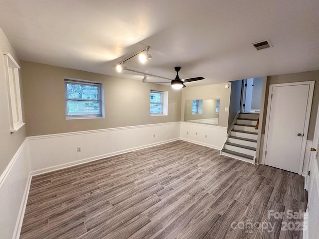 7812 Highbanks Ct, Charlotte, NC 28212 - interior space featuring stairs, a ceiling fan, wood finished floors, baseboards, and visible vents