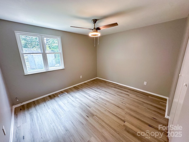 7812 Highbanks Ct, Charlotte, NC 28212 - interior space featuring visible vents, baseboards, ceiling fan, and wood finished floors