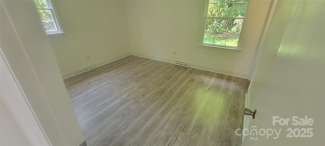 425 Whitethorn Dr, Gastonia, NC 28054 - empty room featuring wood finished floors and baseboards