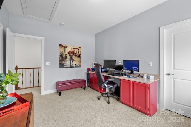 office space featuring baseboards and light carpet