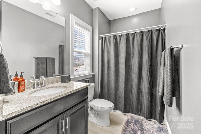 bathroom featuring tile patterned flooring, visible vents, toilet, a shower with curtain, and vanity