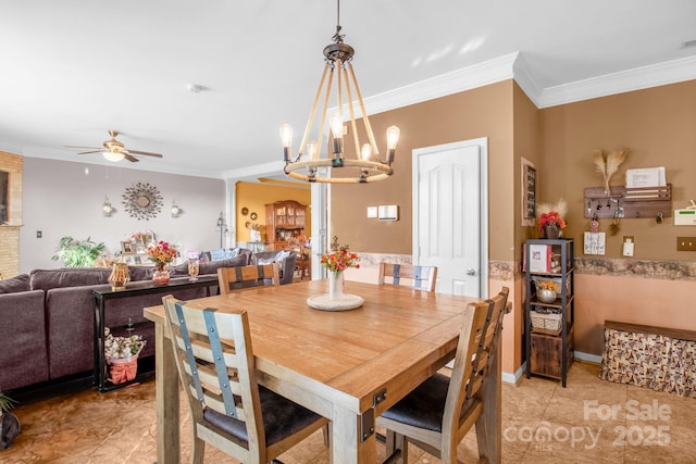 dining room featuring light tile patterned floors, ceiling fan with notable chandelier, and ornamental molding