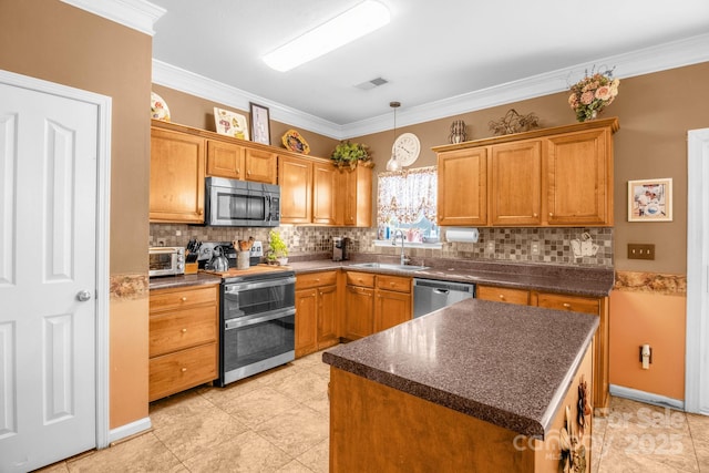 kitchen with dark countertops, brown cabinetry, visible vents, and appliances with stainless steel finishes