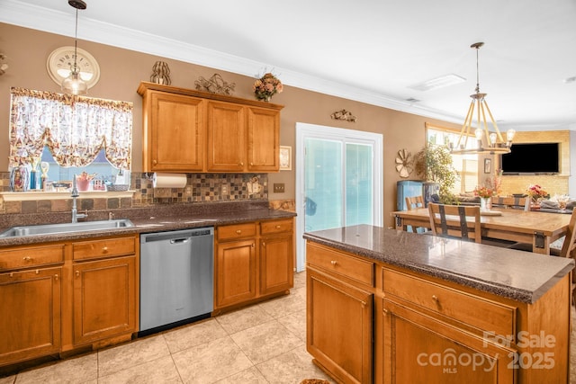 kitchen featuring a sink, brown cabinets, and stainless steel dishwasher