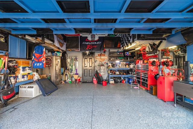 garage with a workshop area