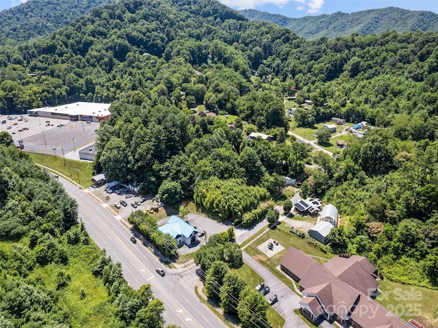 drone / aerial view with a forest view