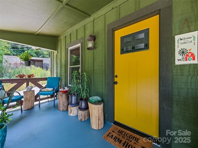 property entrance with a porch