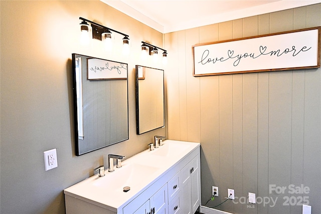 bathroom with double vanity and a sink