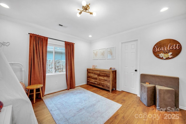 bedroom with visible vents, baseboards, ornamental molding, recessed lighting, and wood finished floors