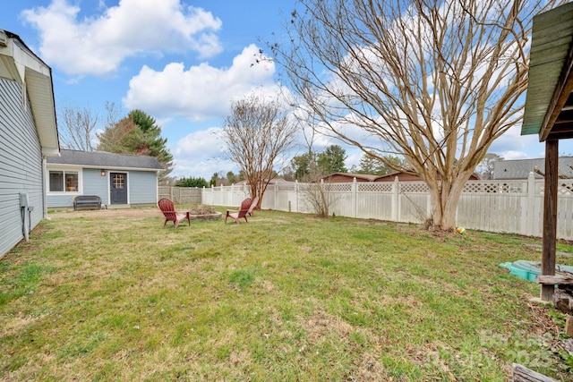 view of yard with a fenced backyard