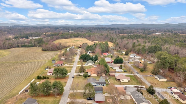 drone / aerial view featuring a mountain view