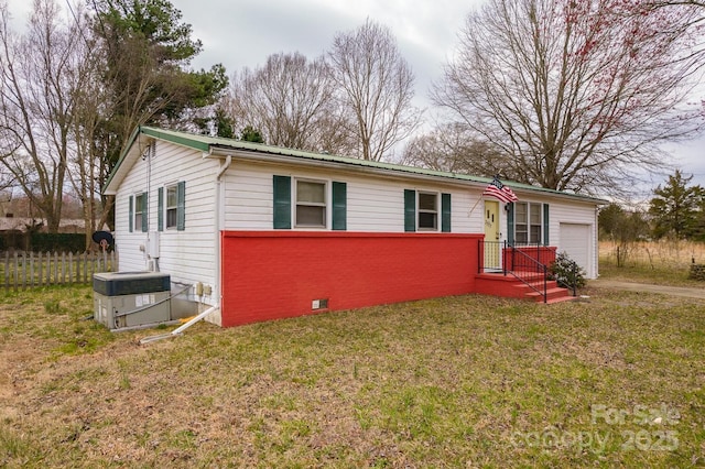 ranch-style house featuring a front yard, fence, an attached garage, crawl space, and brick siding