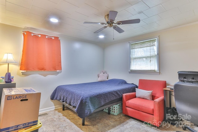 bedroom featuring crown molding, baseboards, and ceiling fan