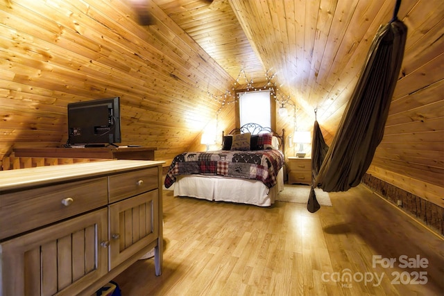 151 Pinewood Dr, Murphy, NC 28906 - bedroom featuring light wood-style flooring, wood ceiling, wood walls, and vaulted ceiling