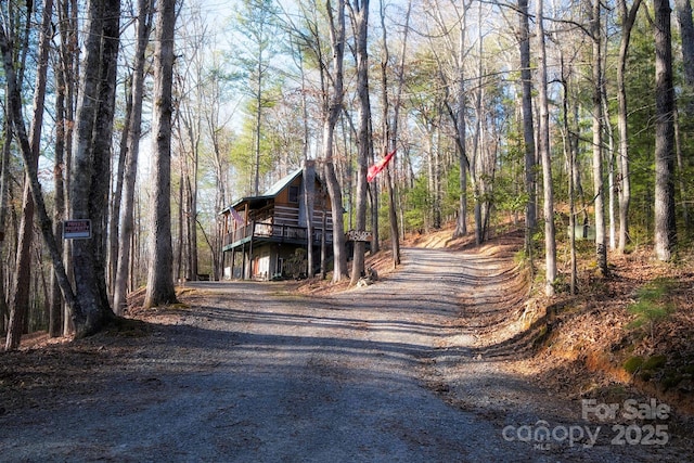 151 Pinewood Dr, Murphy, NC 28906 - view of street with gravel driveway and a view of trees