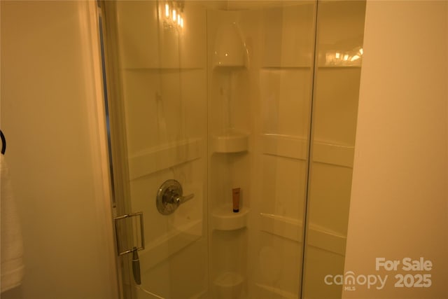 full bath featuring a stall shower