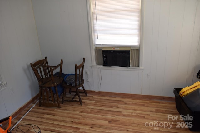 sitting room featuring wood finished floors