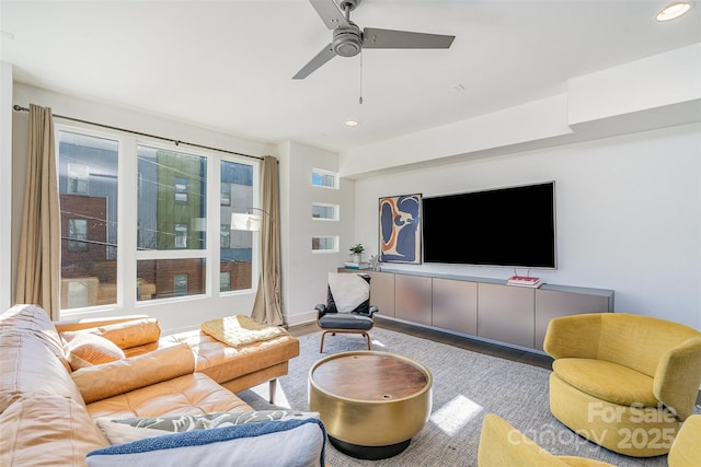 living room with recessed lighting, wood finished floors, and ceiling fan