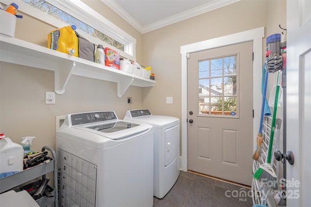 washroom with laundry area, independent washer and dryer, a healthy amount of sunlight, and ornamental molding