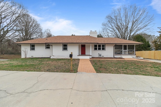 ranch-style home with a front lawn, fence, a sunroom, crawl space, and a chimney