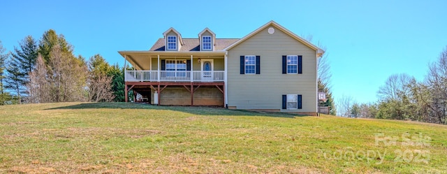 back of house with a lawn