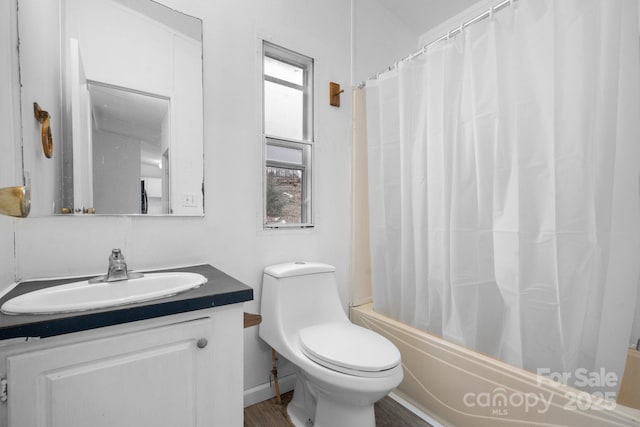 bathroom with vanity, toilet, and shower / bathtub combination with curtain