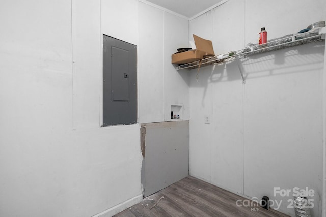 laundry area with electric panel, laundry area, hookup for a washing machine, and wood finished floors