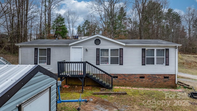 view of front of home with crawl space