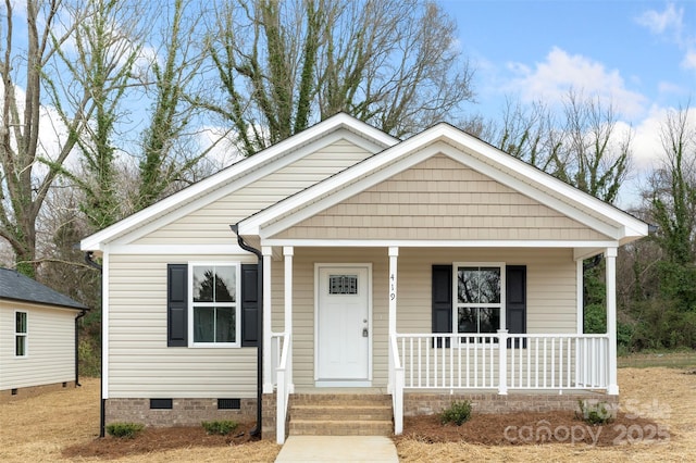 bungalow-style house featuring crawl space and a porch