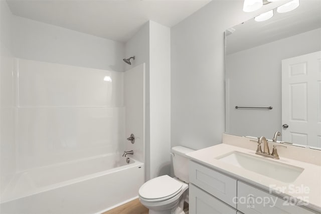 full bathroom with vanity, toilet, and shower / bathtub combination