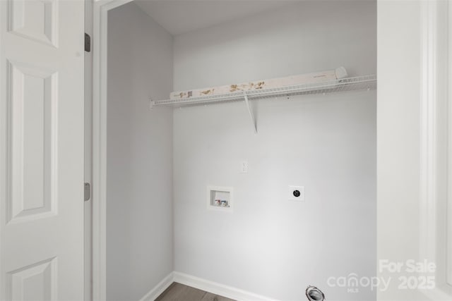 washroom featuring hookup for a washing machine, hookup for an electric dryer, baseboards, and wood finished floors