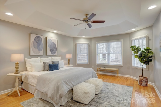 5306 Club View Dr, Concord, NC 28025 - bedroom featuring a raised ceiling, light wood-style flooring, baseboards, recessed lighting, and ceiling fan