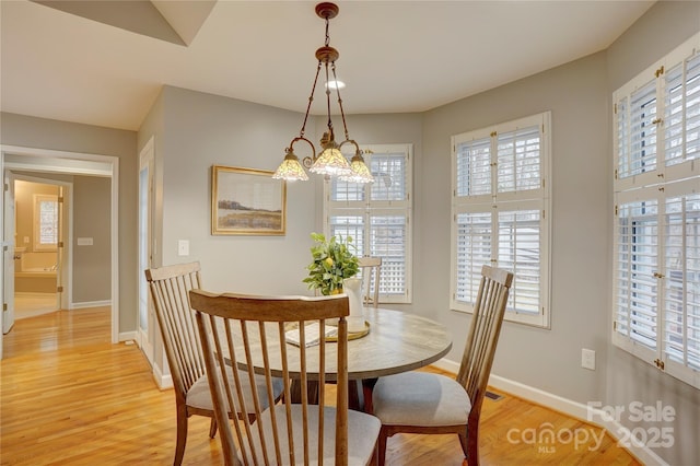 5306 Club View Dr, Concord, NC 28025 - dining area with light wood-style flooring and healthy amount of natural light