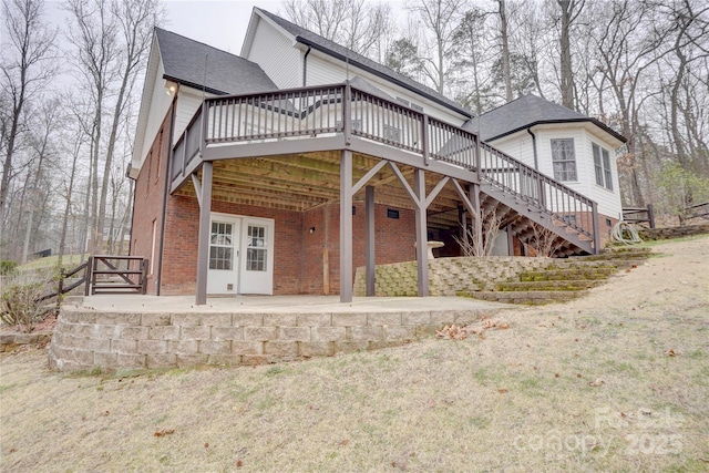 5306 Club View Dr, Concord, NC 28025 - view of front of house featuring a wooden deck, stairs, brick siding, french doors, and a shingled roof