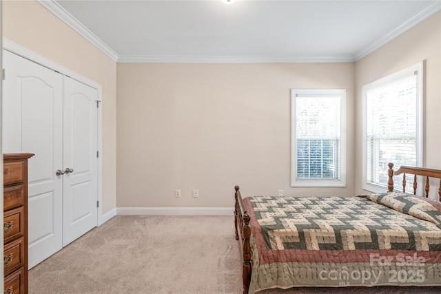 unfurnished bedroom featuring ornamental molding, baseboards, and carpet floors