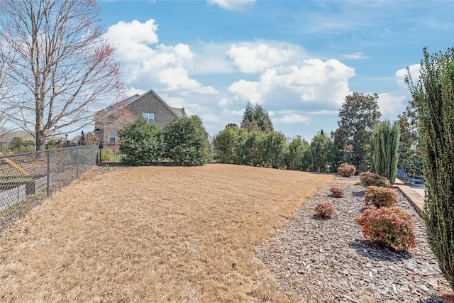 view of yard with fence