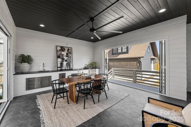 dining area with wooden ceiling, wooden walls, recessed lighting, and ceiling fan