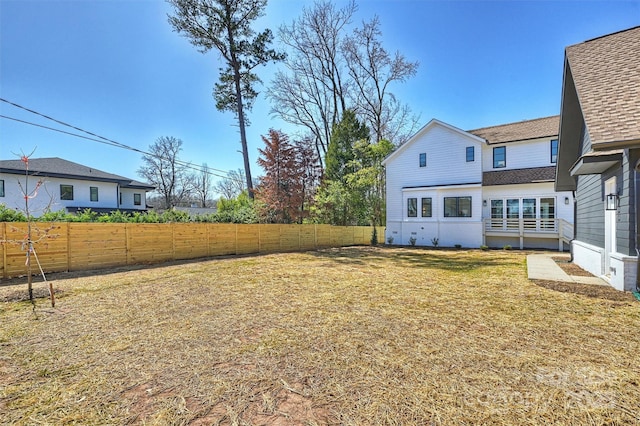 view of yard featuring fence
