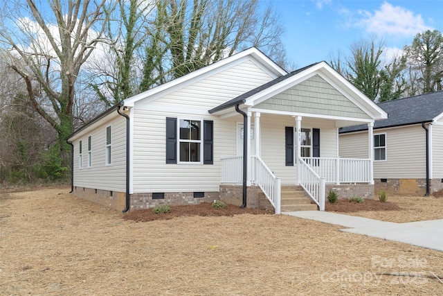 view of front of house featuring crawl space and covered porch