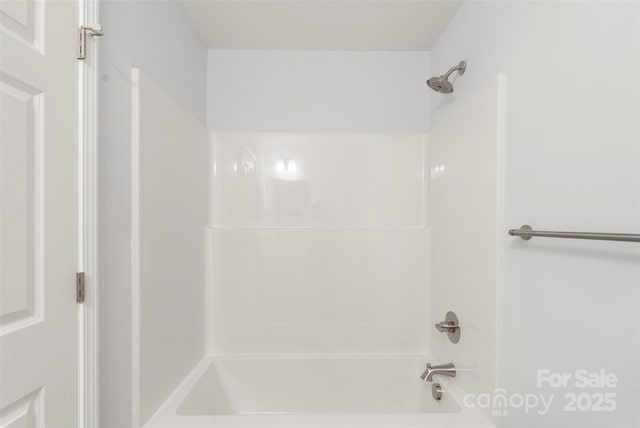 full bath featuring tub / shower combination