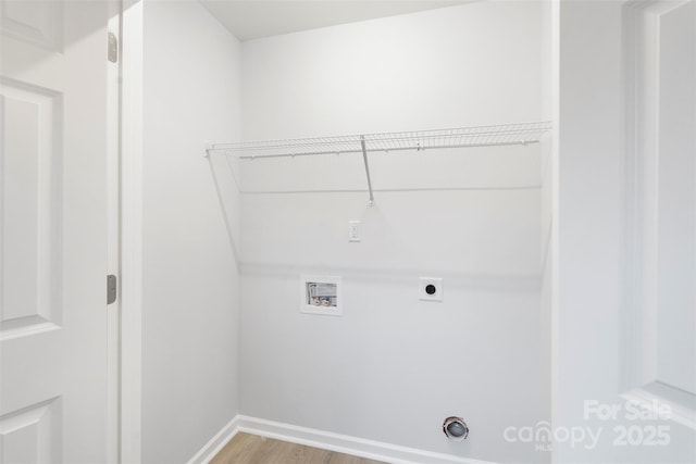 laundry room with baseboards, hookup for an electric dryer, laundry area, washer hookup, and light wood-type flooring