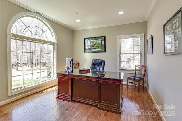 office area with recessed lighting, baseboards, crown molding, and light wood finished floors