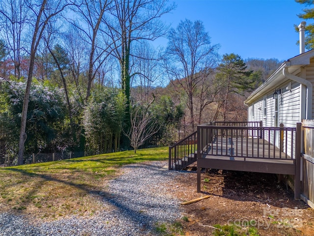 view of yard featuring a deck