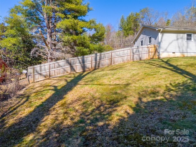 view of yard featuring fence