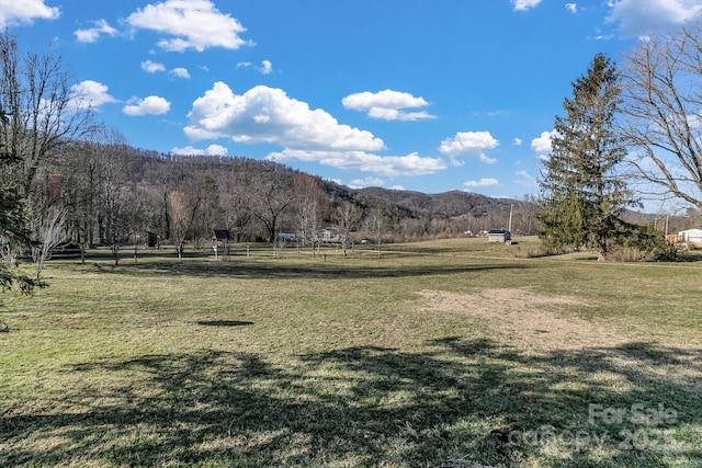 view of mountain feature with a rural view