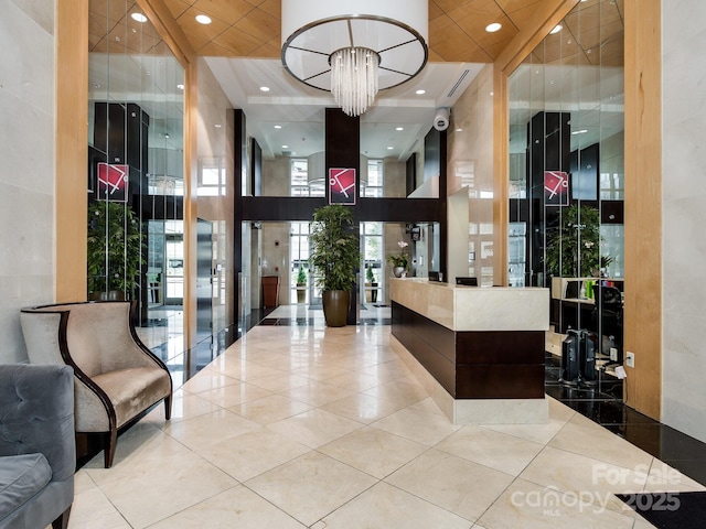 reception area featuring a notable chandelier