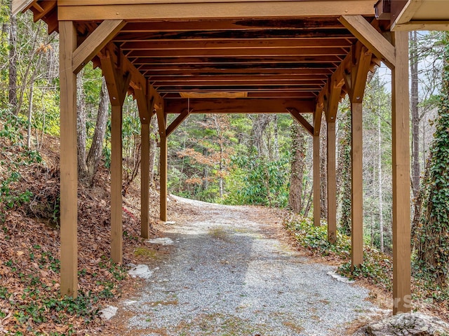 exterior space featuring a view of trees